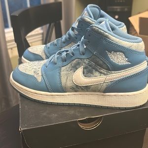 Used a few times.  Like new.  Jordan 1 Mids.  Size 5Y